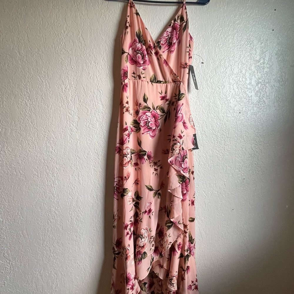 Adjustable spaghetti straps; V-neck/back; High waist, faux wrap; maxi skirt